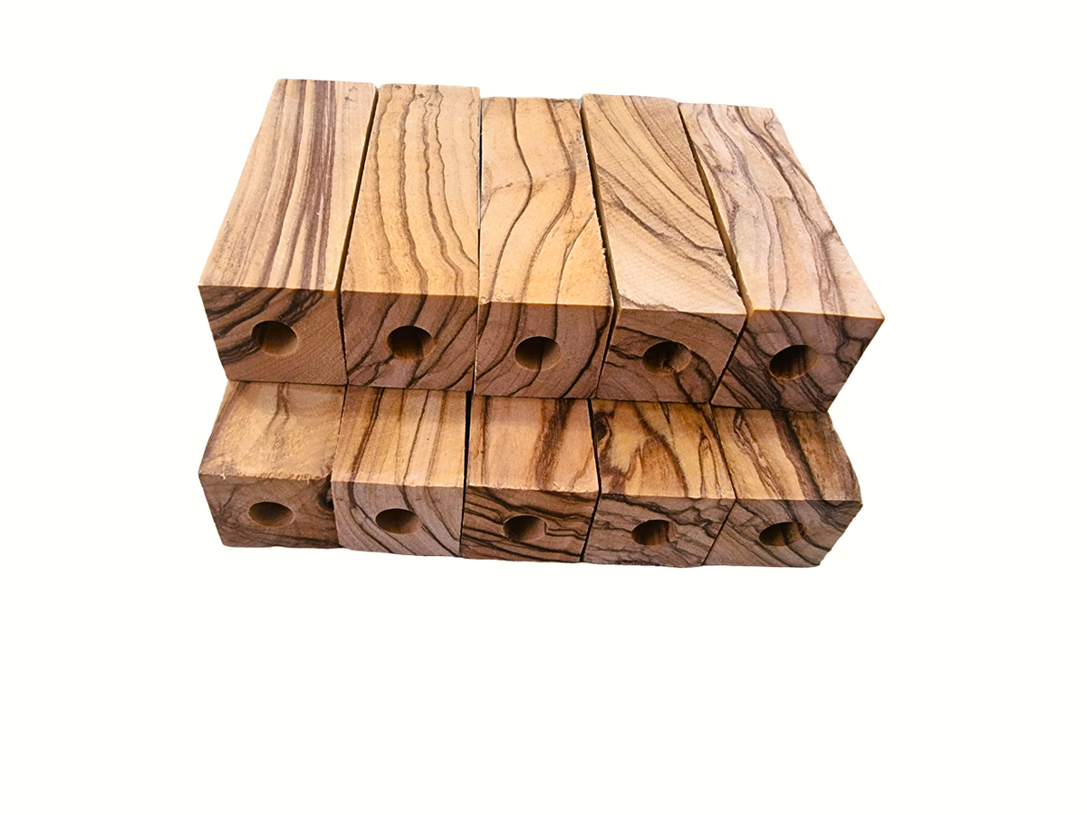 Five Stacked Bethlehem Olive Wood Short Pen Blanks Stacked On Top Of Five Pen Blanks.