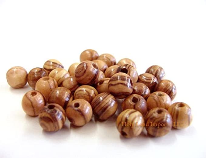 Combinaton Of Different Size Olive Wood Beads.